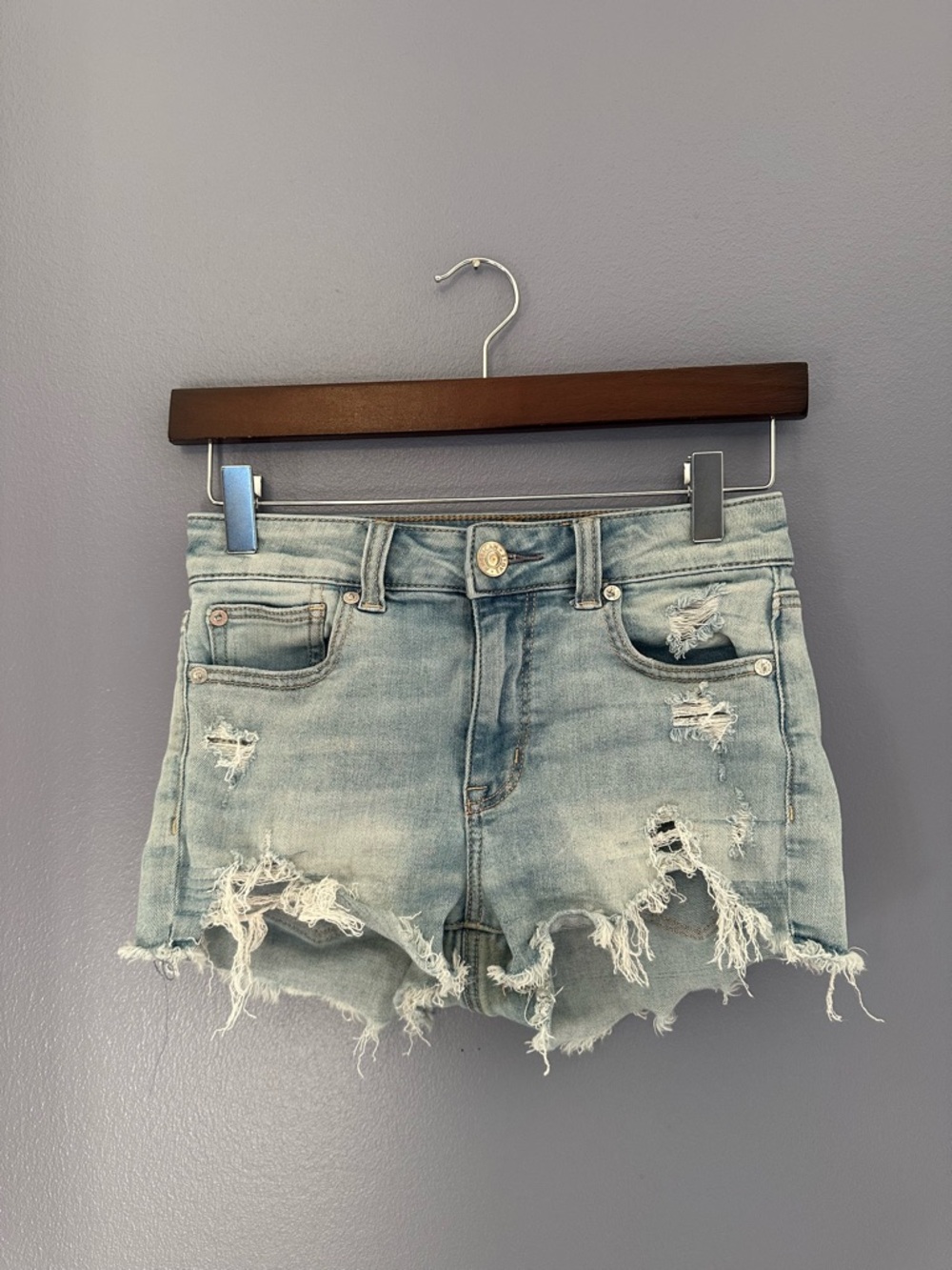 Festival Distressed Denim Cut-Offs High Rise